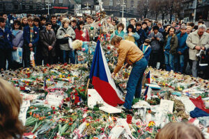 Vaclav Havel and protesters commemorate the struggle for Freedom and Democracy at Prague memorial during 1989 Velvet Revolution.